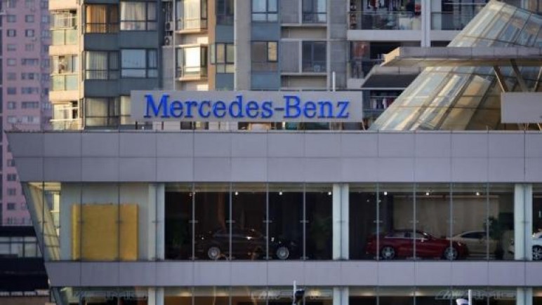 Daimler cuts car market forecast as Europe wobbles