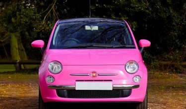 PHOTO OF PINK FIAT 500 CAR