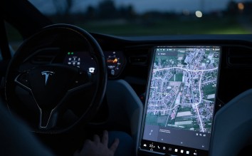 VIEW OF TABLET SHOWING THE MAP IN A TESLA