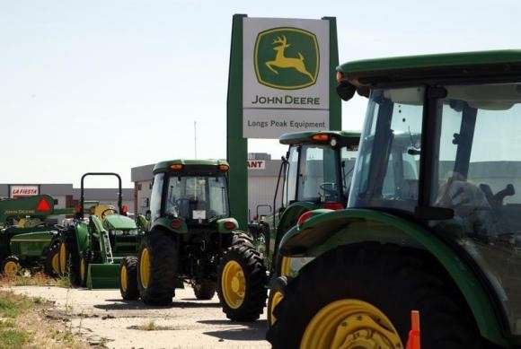 Deere says equipment sales to fall further as farm incomes drop