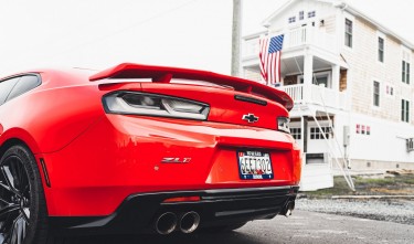 BACK OF A RED CHEVROLET CAMARO